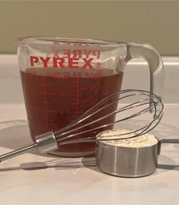 beef broth, flour, and whisk