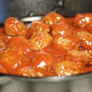 homemade barbeque meatballs in cast iron pan