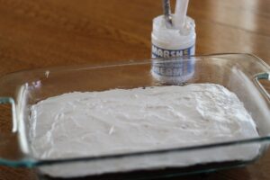 marshmallow cream layer spread on top of brownie layer