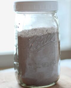 dairy free hot chocolate mix in a glass jar