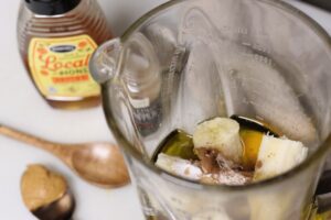 wet ingredients for gluten free & dairy free banana chocolate chip muffins in blender