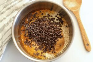 ingredients for peanut butter energy balls in mixing bowl