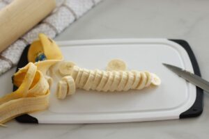sliced banana on cutting board