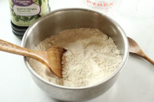 dry ingredients in mixing bowl for homemade pizza dough