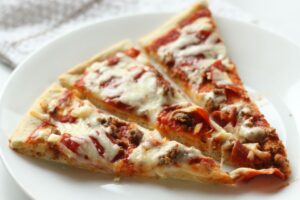 3 slices of homemade pizza on a plate
