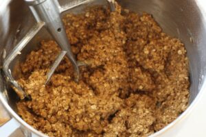 dough for iced oatmeal cookies in stand mixer bowl