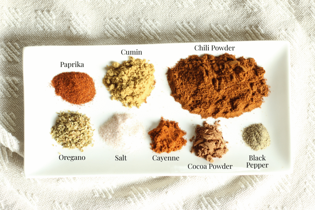 seasonings for homemade chili laid out on a platter