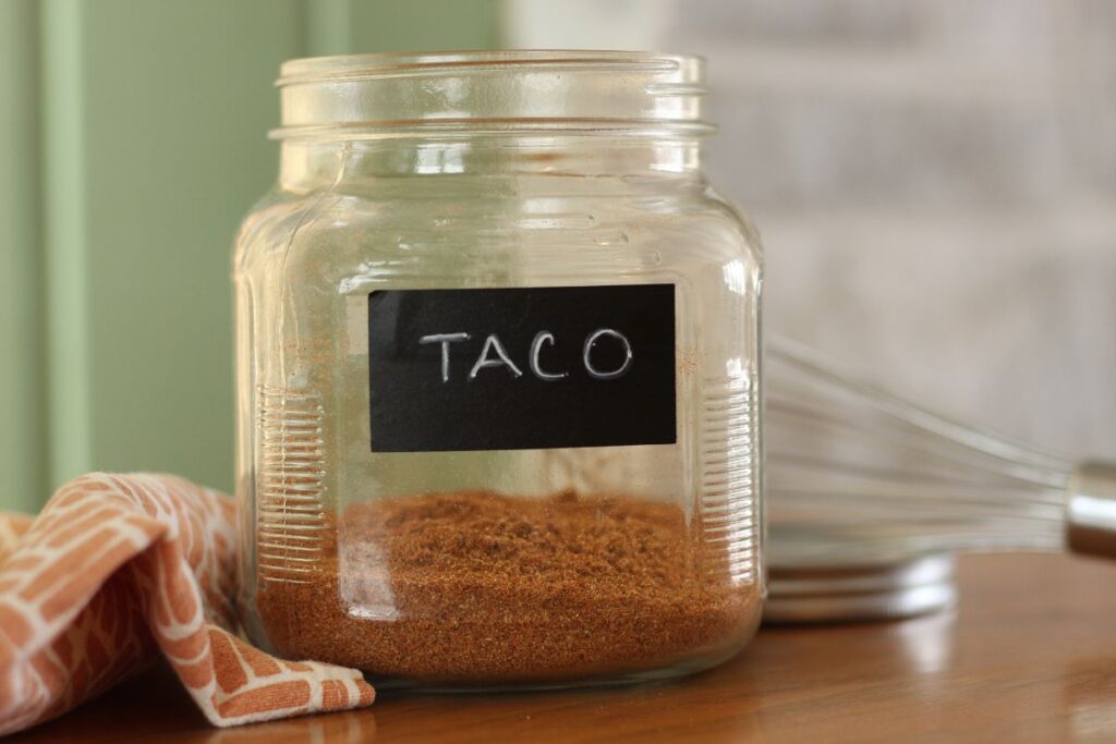 diy taco seasoning in a glass jar