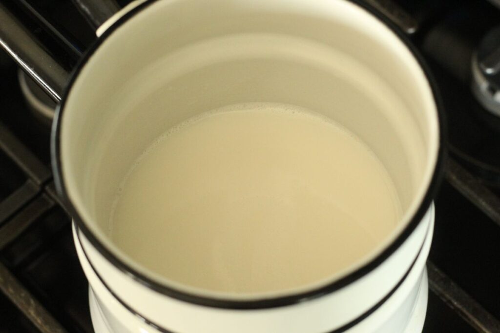 melted soap base in double boiler