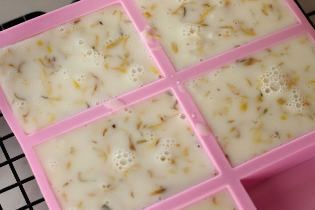 poured garden hands soap in silicone molds showing air bubbles that form