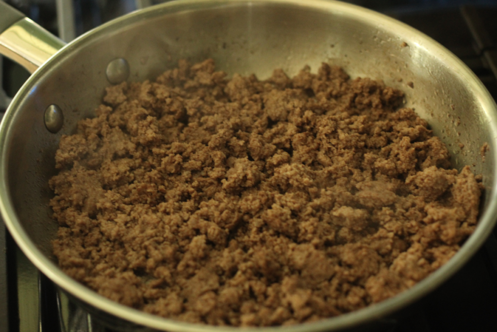 browned ground beef in a skillet