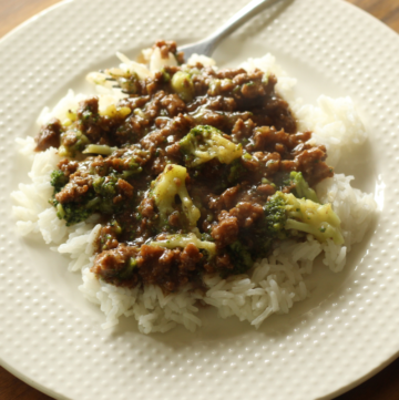 easy beef & broccoli stir fry on a plate with a fork