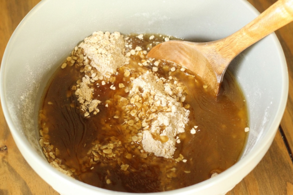 bowl of wet ingredients poured into dry ingredients